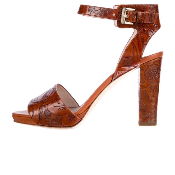 Escada Leather Sandals
Brown
Wrap-Around Straps & Buckle Closure at Ankles - Picture 2 of 5